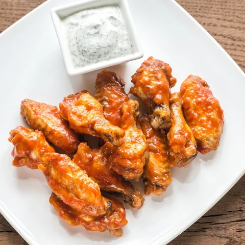 Chicken Wings - Crispy chicken wings with your choice of sauce