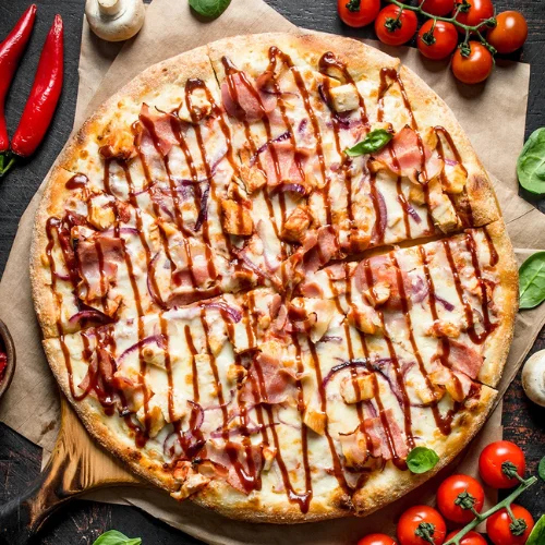 Gourmet Pizza - Our signature Greek-style pizza with a perfectly crispy crust, tangy sauce, and a generous layer of melted cheese topped with your favorite premium ingredients.